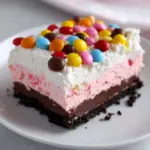 Pink Paradise: No-Bake M&M Snickers Cheesecake Recipe