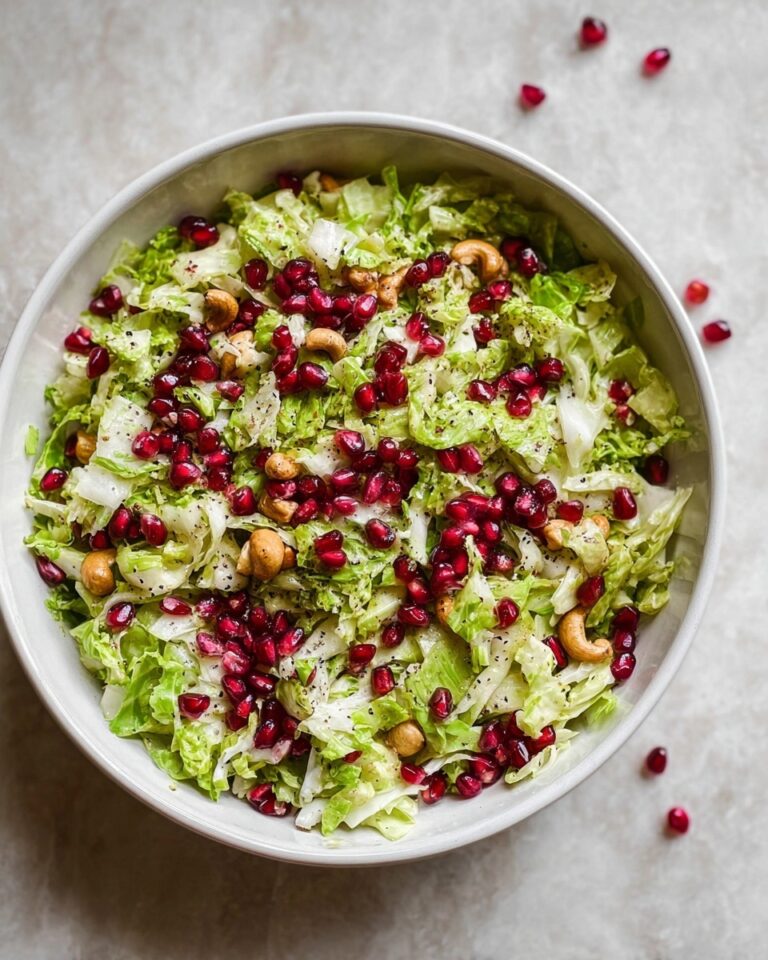 Winter Brussels Sprouts Slaw with Apples, Pomegranate, and Candied Cashews Recipe