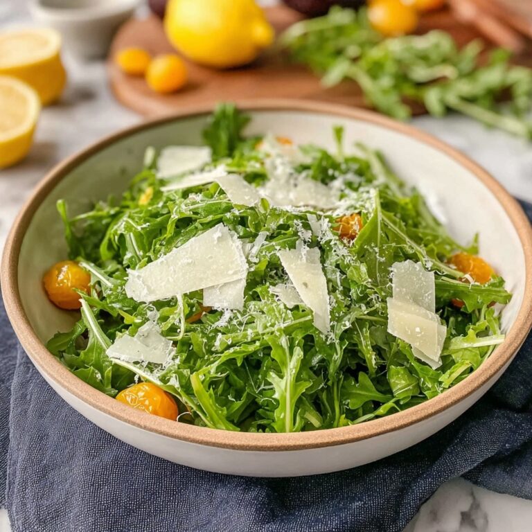 Arugula Salad with Cherry Tomatoes, Cucumber, Feta, and Balsamic-Honey Vinaigrette Recipe